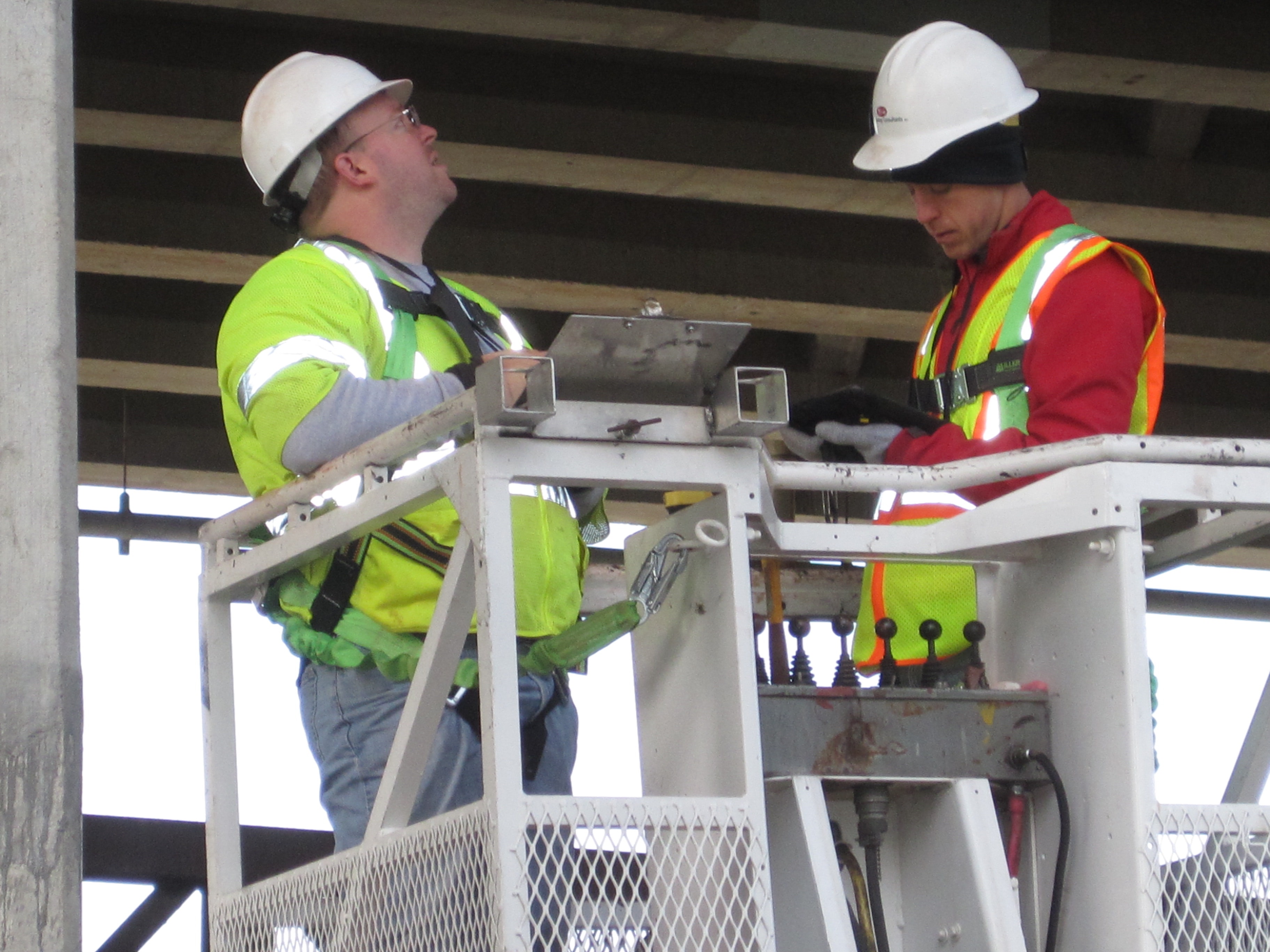 Tradesperson on-site specialized tools digital invoicing tablet
