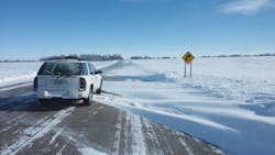 SF_snow-drifts-on-road-curve SF_snow-drifts-on-road-curve