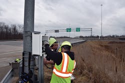 Workers Install Roadside Dsrc Equipment On The Ohio Turnpike At Exit 161 Workers Install Roadside Dsrc Equipment On The Ohio Turnpike At Exit 161