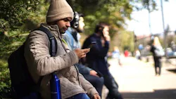 Student%20with%20smart%20phone%20at%20stop Student%20with%20smart%20phone%20at%20stop