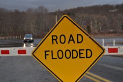 Road_flooded_sign_Gidly_Road