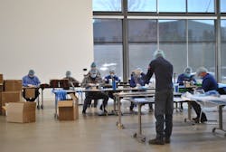 1654796149583 Genie Team Members Making Face Coverings In Hub 1654796149583 Genie Team Members Making Face Coverings In Hub