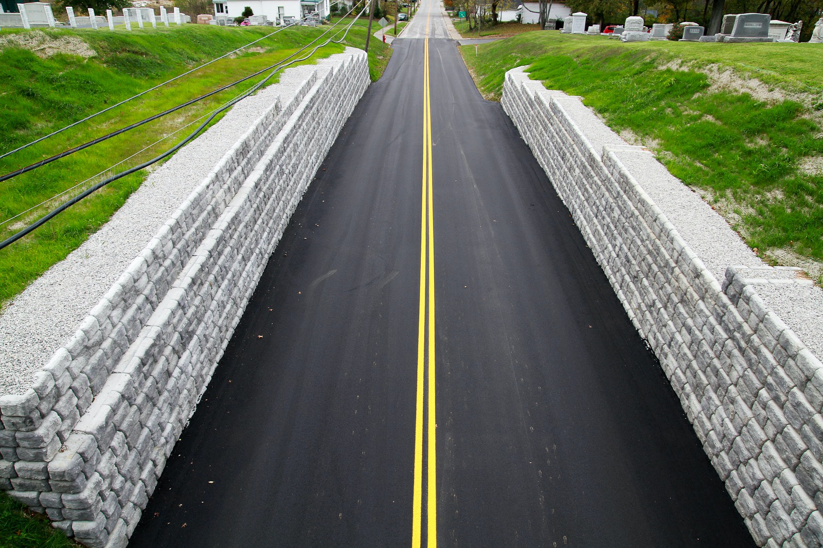 1654878004865 Retainingwallsredirockcobblestoneroaderosionsolution2