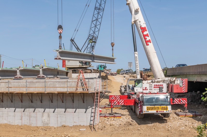Cranes assist bridge work on Indiana's I69 Finish Line project Roads