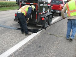 Small%20crew%20applies%20Mastic%20One%20to%20a%20single%20lane%20at%20a%20time Small%20crew%20applies%20Mastic%20One%20to%20a%20single%20lane%20at%20a%20time