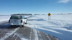 SF_snow-drifts-on-road-curve