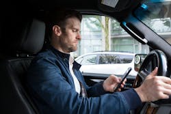 A Middle Aged Caucasian Man Distracted Driving While Using A Mobile Device 162724637 62bdce26ddd64 A Middle Aged Caucasian Man Distracted Driving While Using A Mobile Device 162724637 62bdce26ddd64