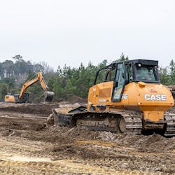 The CASE CX300D excavator and 1150M dozer work together to tackle the job. The CASE CX300D excavator and 1150M dozer work together to tackle the job.