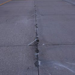 Deterioration on taxiway prior to repair.