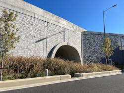 The completed TechSpan tunnel and a Reinforced Earth MSE wall with the final stone veneer. The completed TechSpan tunnel and a Reinforced Earth MSE wall with the final stone veneer.
