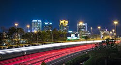 Birmingham, Alabama city skyline and highway traffic trails