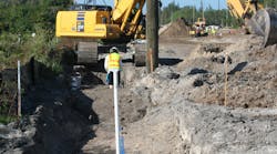 Utility relocation, such as for this water main, almost always impacts the schedule of roadway and bridge construction projects.