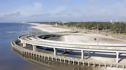 The ramp to the interstate highway 110 in Biloxi, Mississippi blocks the beach so a walkway was constructed after Hurricane Katrina.