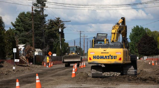 Construction crews work on a portion of Ahtanum Road in Yakima, Wash., on Tuesday, May 16, 2023.