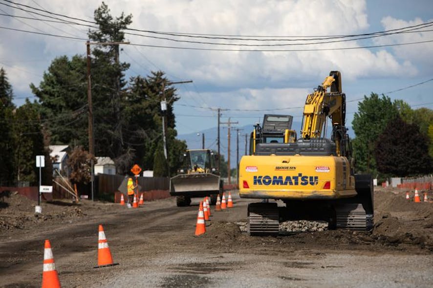 Construction crews work on a portion of Ahtanum Road in Yakima, Wash., on Tuesday, May 16, 2023.