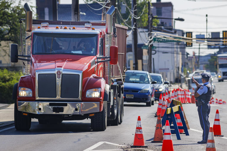 A Philadelphia police officer monitors traffic along State Road. &copy; Alejandro A. Alvarez/The Philadelphia Inquirer/TNS