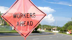 Workers ahead sign