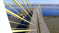 An engineer performs visual assessment of a cable on the southbound bridge using rope access. An engineer performs visual assessment of a cable on the southbound bridge using rope access.