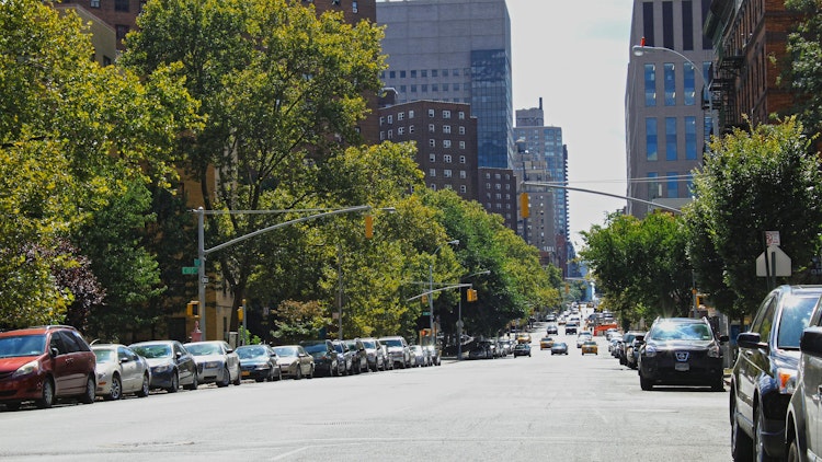 Cars parked along 105th Street in New York City, New York.