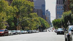 Cars parked along 105th Street in New York City, New York. Cars parked along 105th Street in New York City, New York.