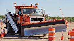 A snowplow operator practices on a Minnesota Department of Transportation training course.