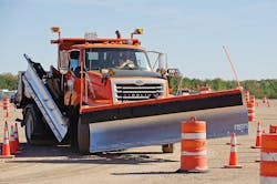 A snowplow operator practices on a Minnesota Department of Transportation training course. A snowplow operator practices on a Minnesota Department of Transportation training course.