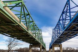 The Mormon Bridge spanning across the Missouri River in Omaha, Nebraska. The Mormon Bridge spanning across the Missouri River in Omaha, Nebraska.