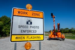 A sign announces automated speed enforcement cameras in a work zone at an Aug. 12 Kentucky Transportation Cabinet press event. A sign announces automated speed enforcement cameras in a work zone at an Aug. 12 Kentucky Transportation Cabinet press event.