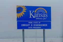 A road sign welcoming drivers to the state of Kansas, home to Dwight D. Eisenhower. A road sign welcoming drivers to the state of Kansas, home to Dwight D. Eisenhower.