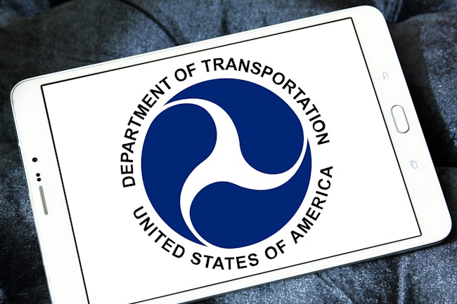 The U.S. Department of Transportation's logo displayed on a tablet.