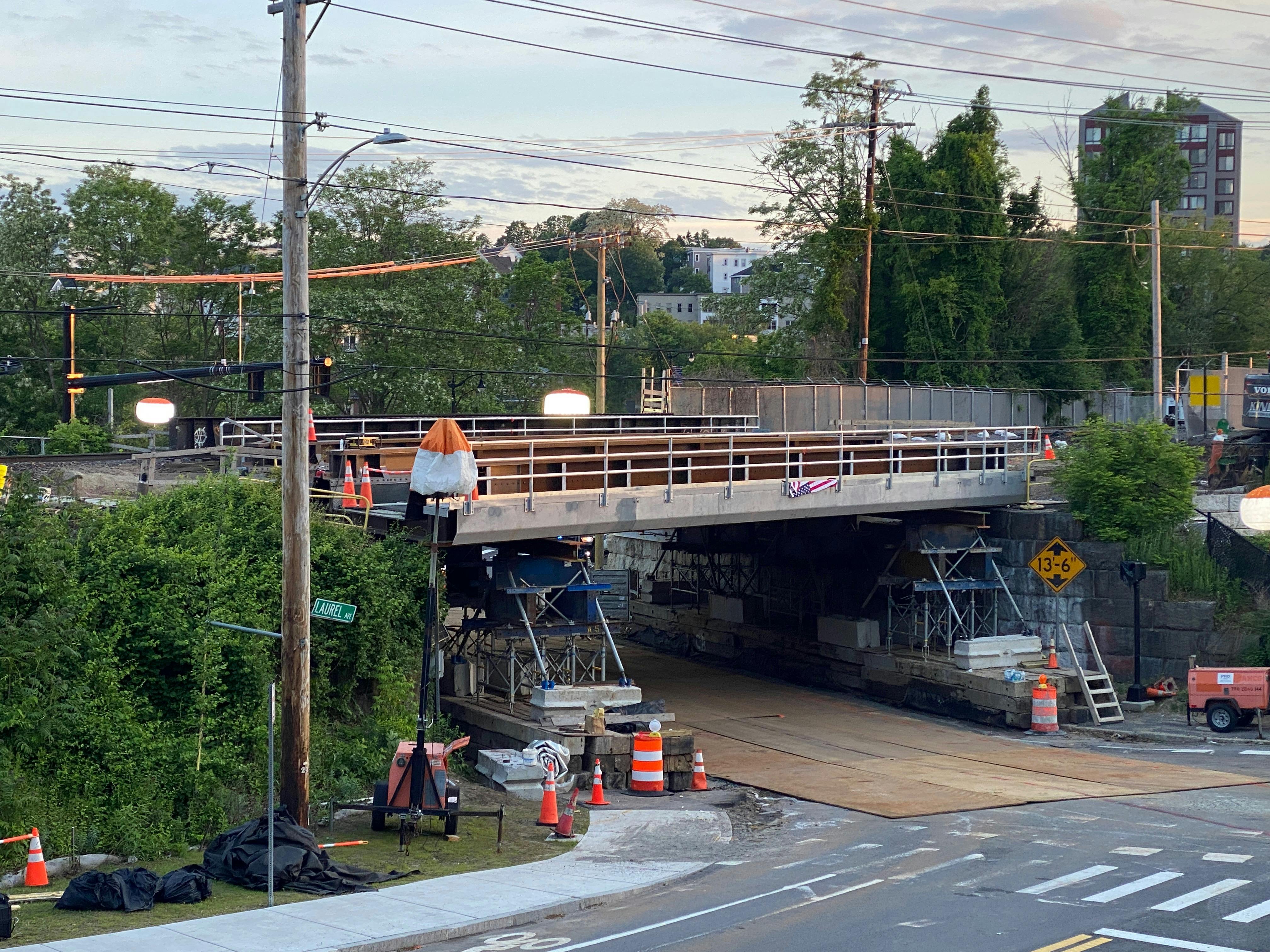 The steel superstructure on temporary shoring adjacent to Its final location in Haverhill, Massachusetts.