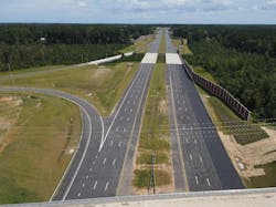 The Triangle Expressway mainline extension near Bells Lake Road in Raleigh, North Carolina. The Triangle Expressway mainline extension near Bells Lake Road in Raleigh, North Carolina.