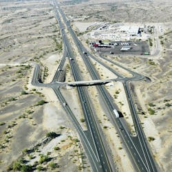 An aerial view of Interstate-10 cutting through the deserts in southwestern Arizona. An aerial view of Interstate-10 cutting through the deserts in southwestern Arizona.