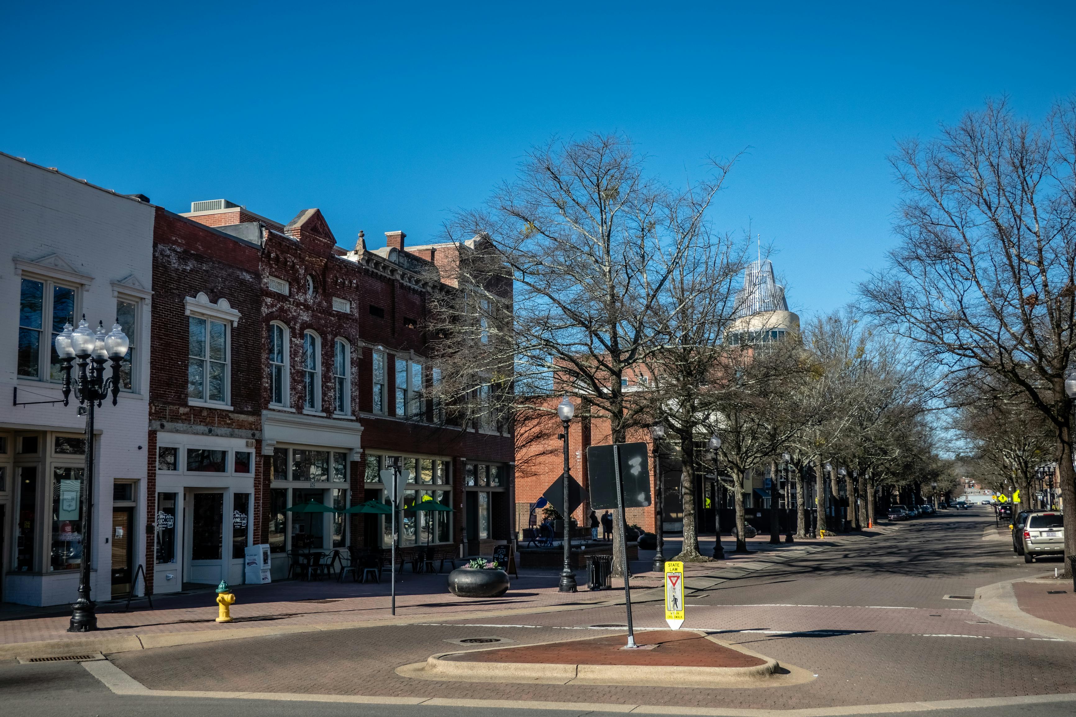 A view of a streetscape in Fayetteville, N.C., where a triangle in the roadway is shown.