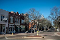 A view of a streetscape in Fayetteville, N.C., where a triangle in the roadway is shown. A view of a streetscape in Fayetteville, N.C., where a triangle in the roadway is shown.