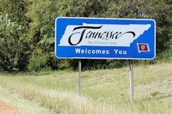 A Welcome to Tennessee sign displayed on the side of a highway A Welcome to Tennessee sign displayed on the side of a highway