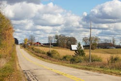 A rural road in Michigan during the fall. A rural road in Michigan during the fall.