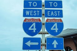 A pair of road signs leading traffic to Interstate 4 in Florida. A pair of road signs leading traffic to Interstate 4 in Florida.