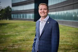 Mac Milburn poses outside of Garver. Mac Milburn poses outside of Garver.