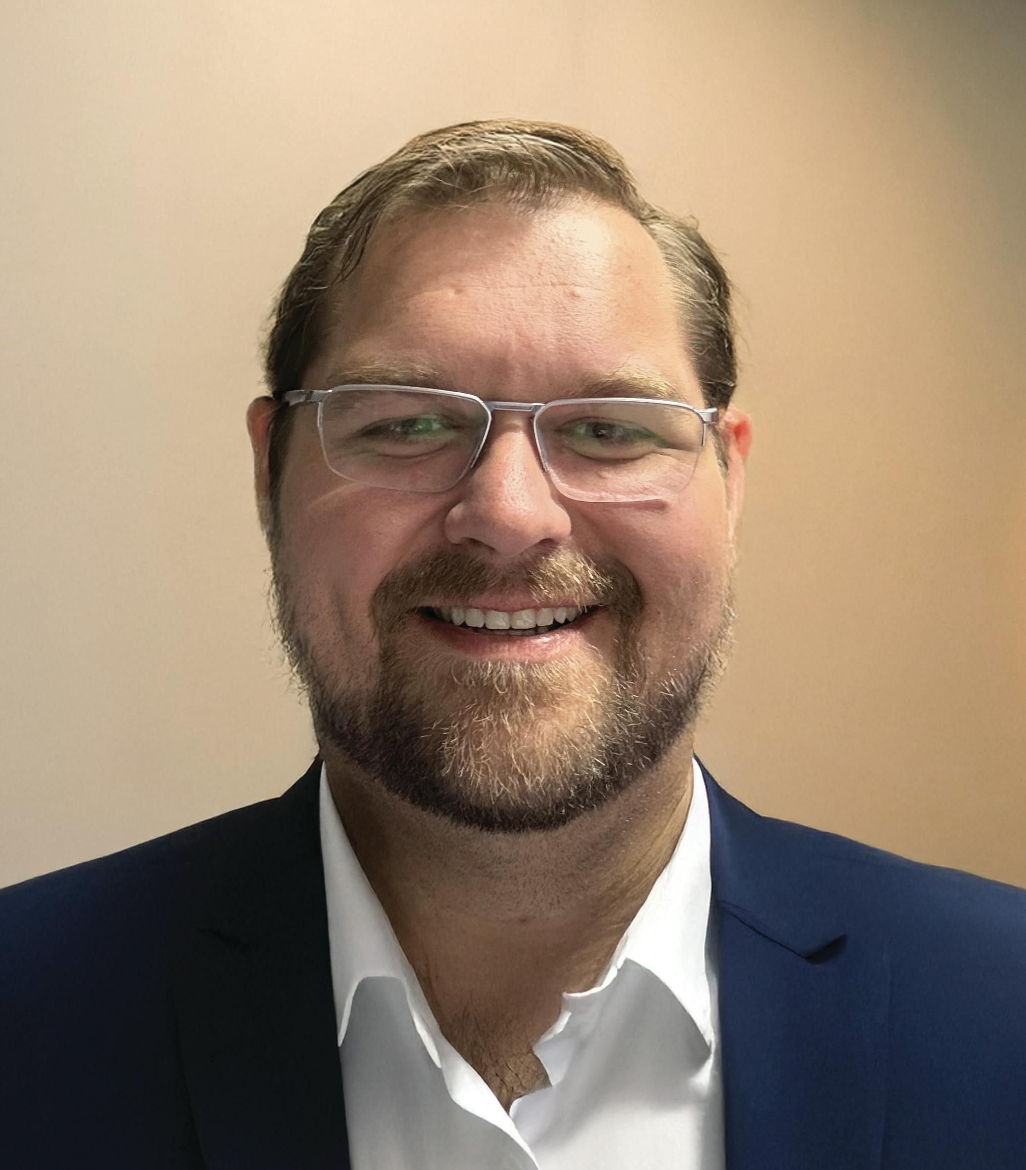 A headshot of Gregory Kleinrichert Jr.