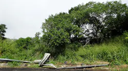 A broken guardrail on a mountain road on the Hawaiian island of Oahu.