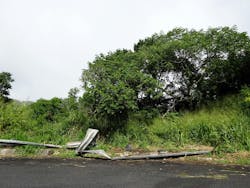 A broken guardrail on a mountain road on the Hawaiian island of Oahu. A broken guardrail on a mountain road on the Hawaiian island of Oahu.