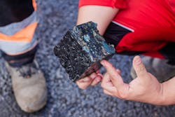 A cube of asphalt taken from the roadway. A cube of asphalt taken from the roadway.