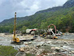A crane and crews conducting recovery work in the aftermath of Hurriane Helene A crane and crews conducting recovery work in the aftermath of Hurriane Helene
