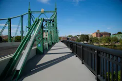 A cantilever sidewalk running parallel to a vehicle bridge. A cantilever sidewalk running parallel to a vehicle bridge.