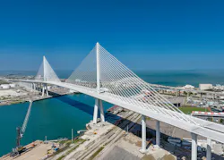 New Harbor Bridge in Corpus Christi, Texas stands tall behind Whataburger Field. New Harbor Bridge in Corpus Christi, Texas stands tall behind Whataburger Field.