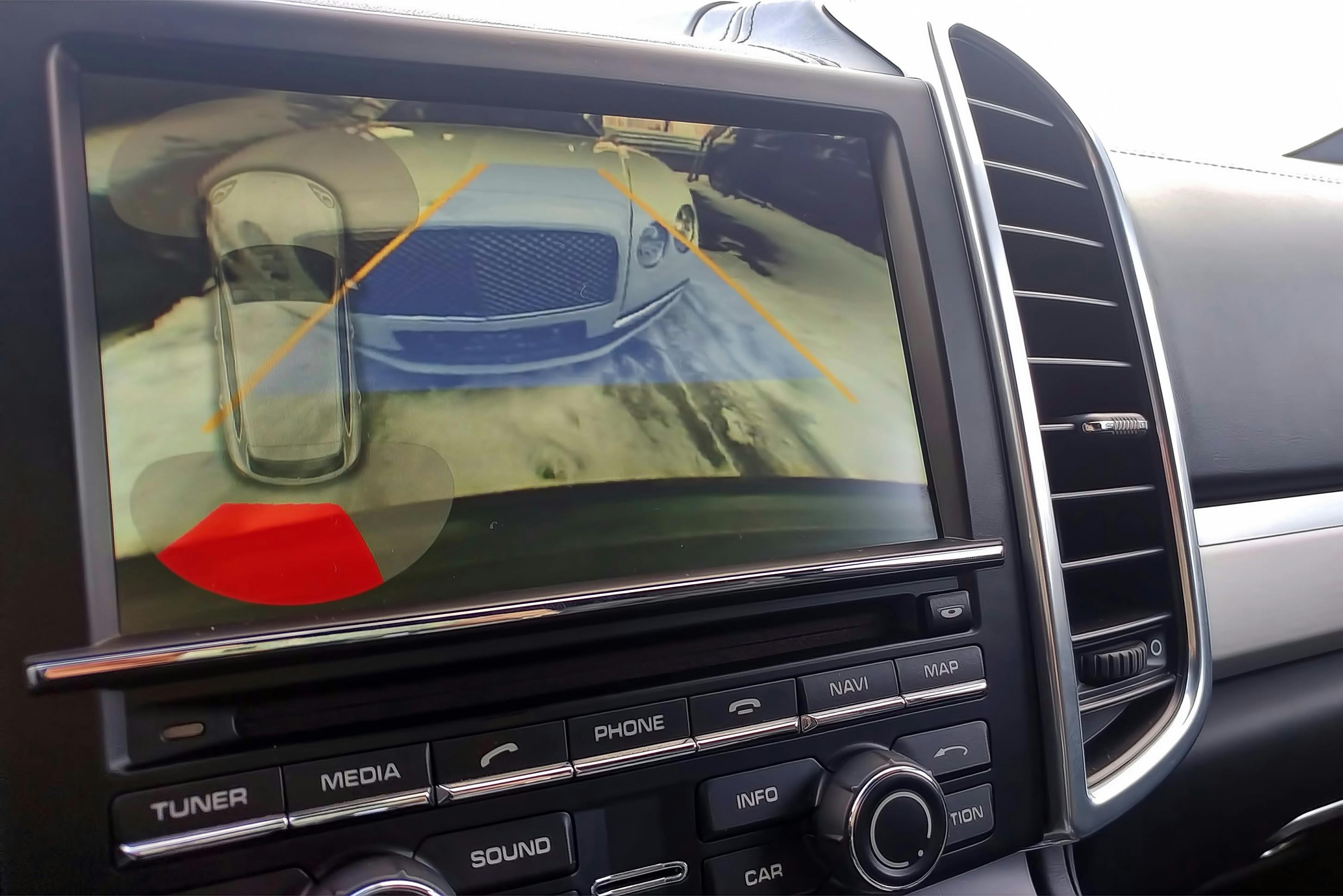 A car screen showing use of the back-up feature.