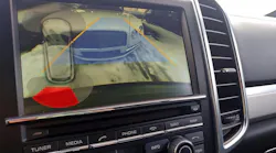 A car screen showing use of the back-up feature.