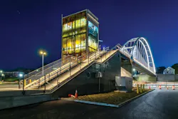 Glass elevators, included for expanded accessibility, served as canvases for public art. Glass elevators, included for expanded accessibility, served as canvases for public art.