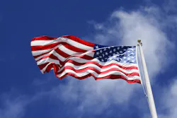 An American flag blowing in the wind. An American flag blowing in the wind.